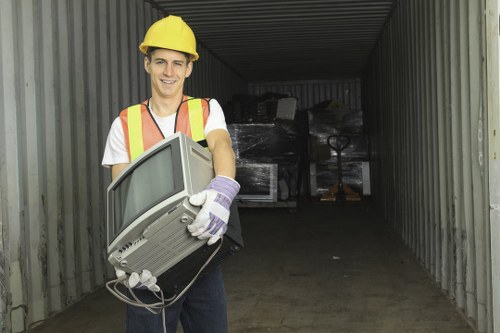 Recycling facility processing wooden furniture in London